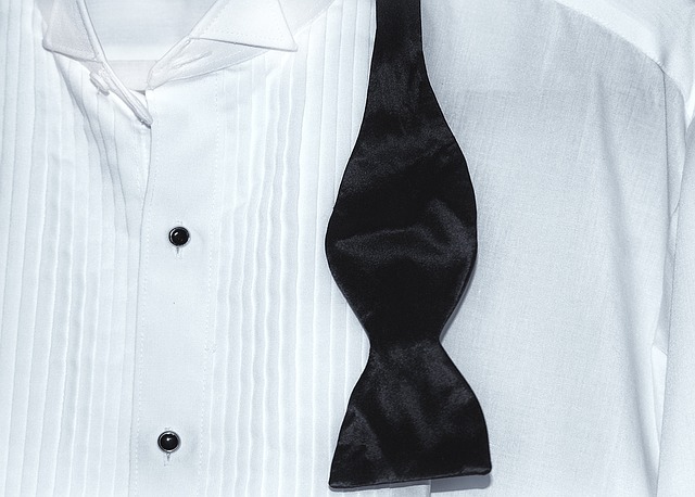 white tuxedo shirt and black bow tie