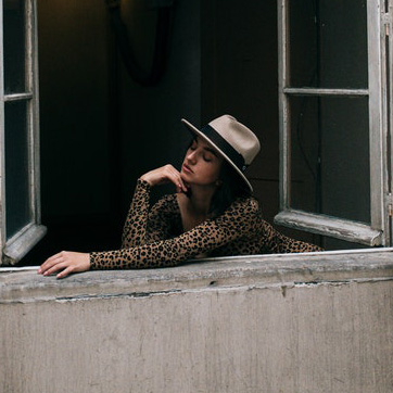 Woman in a fedora